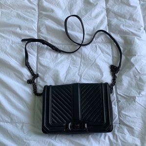 Used, some of the colour has rubbed off on the hardware,otherwise good condition